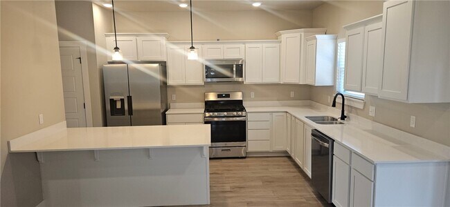 Foto del edificio - 310 W Kinniburgh Dr