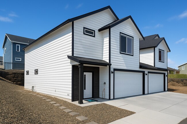 Foto del edificio - 1 MONTH FREE WHEN YOU SIGN A 15 MONTH LEASE! BRAND NEW TOWNHOME IN THE DESIRABLE SOUTHRIDGE AREA!