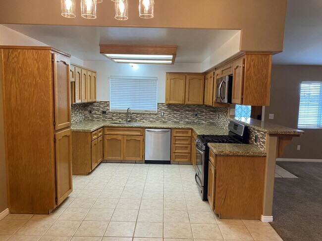 Foto del edificio - 6440 Abby Rose Ave
