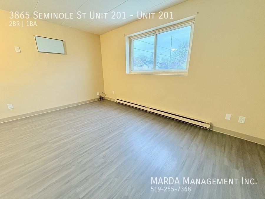 Primary Photo - BRIGHT & SPACIOUS 2BEDROOM/1BATH UNIT ON S...