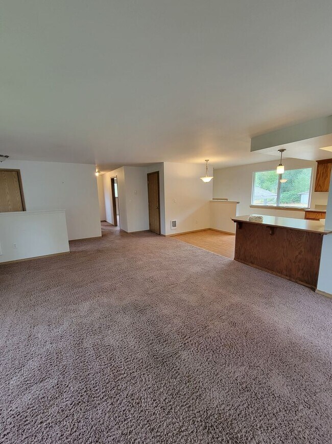 Building Photo - 3 bedroom home on with huge yard and 2760s...