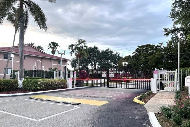 Building Photo - 3241 Sabal Palm Manor