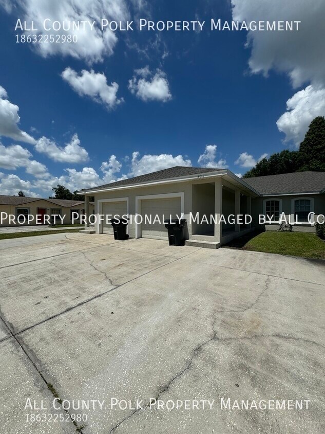 Primary Photo - 2 Bedroom Triplex with Attached Garage in ...