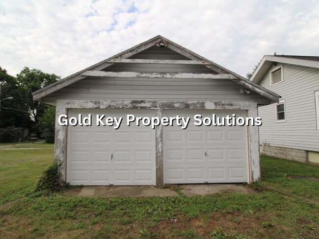 Building Photo - Attractive 2 BR 1 BA House with 2-Car Garage and Covered Porch (NO SECTION 8)