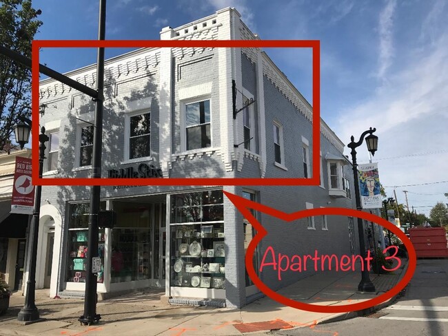 Apartment #3 exterior view. 4 windows overlook Main St. and 3 side windows overlook Maplewood Ave. - 5693 Main St