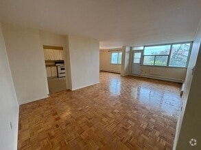Building Photo - 1061 Queen's Blvd