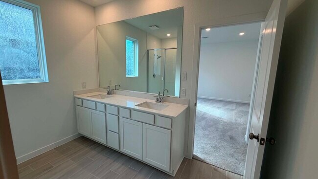 Foto del edificio - 27451 Sunterra Village Dr