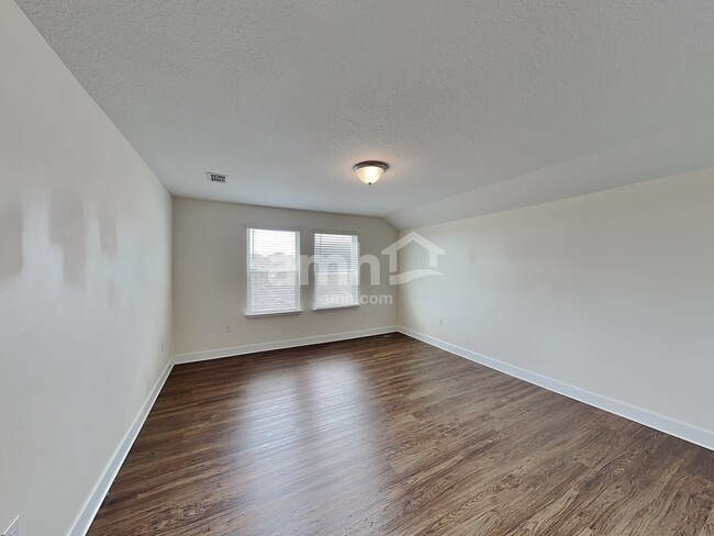 Building Photo - 6614 Hidden Rose Place