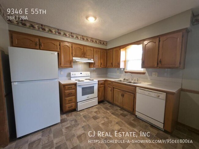 Building Photo - 9346 E 55th-