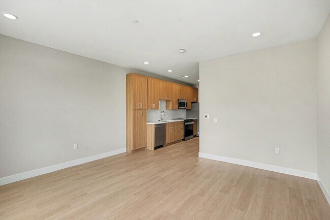 Enhance your lifestyle at Trail House Apartments with this beautifully designed open-concept layout. Enjoy modern finishes and ample natural light that make every corner inviting. Explore the possibilities and schedule your visit today! - Trail House Apartments