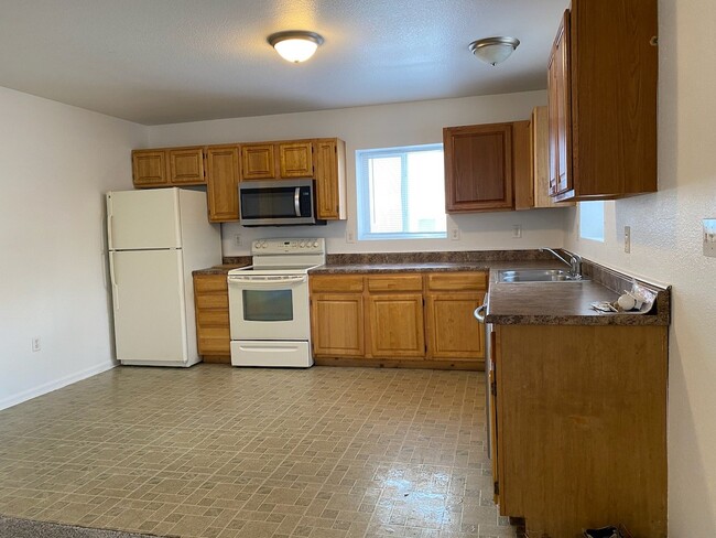 Building Photo - 4-bedroom, 2-bath lower level duplex unit,...