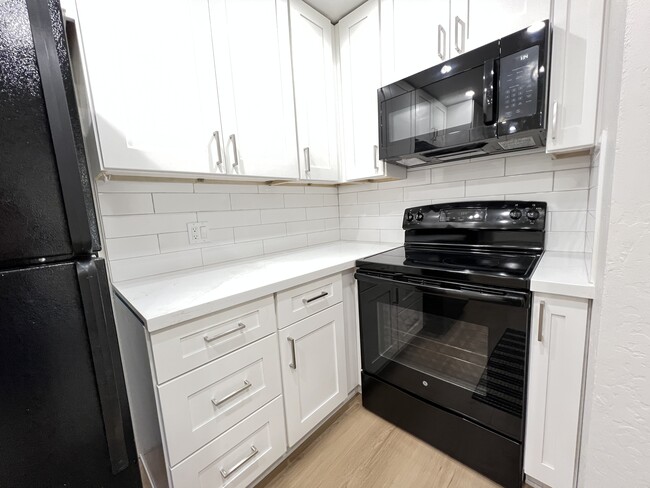 New convection microwave, new soft close cabinetry. - 2935 N 68th St