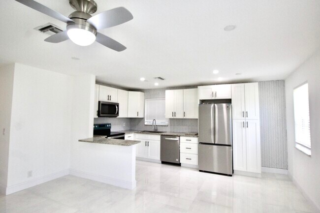 Building Photo - 8871  Sunset Drive  Palm Beach Gardens Fl ...