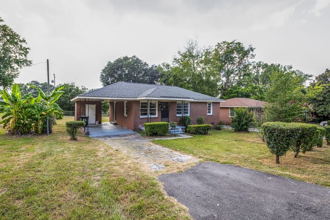 Building Photo - Charming 3-Bedroom Brick Home – Comfort, S...