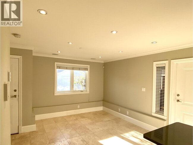 Building Photo - 2XX W 46th Ave