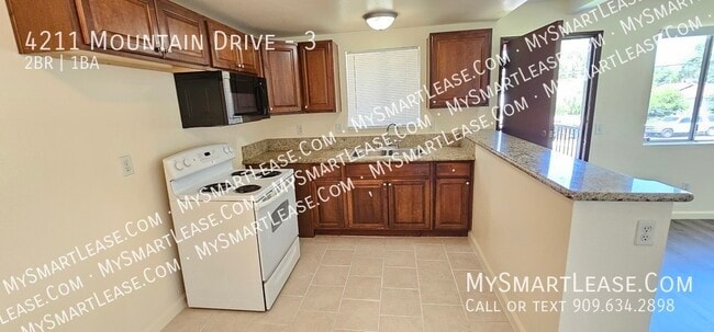 Building Photo - 4211 Mountain Dr
