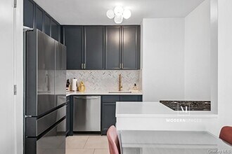 Building Photo - 4-74 48th Avenue Unit 21-E