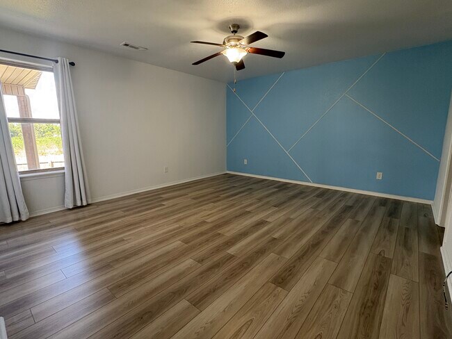 Roomy master bedroom on first floor - 4208 SW Fieldstone Blvd