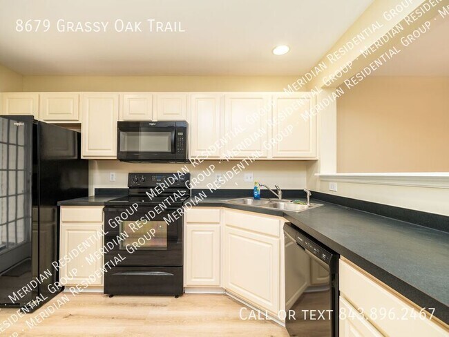 Foto del edificio - 8679 Grassy Oak Trail