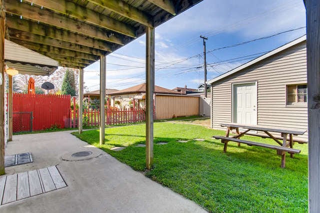 The yard is available for usage, but booked in advance. - 4604 S Komensky Ave