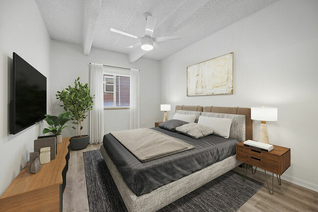 Experience comfort and elegance in this beautifully designed bedroom, perfect for restful nights. - Charmel Apartments