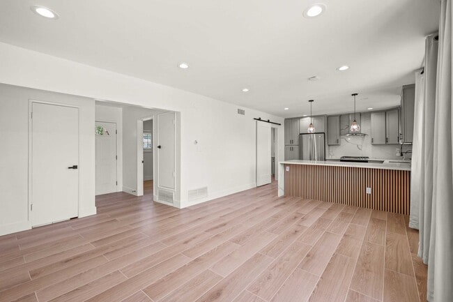 Building Photo - Stylishly Remodeled 4-Bedroom Home in Prim...