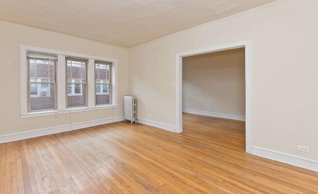 Building Photo - 1335 W Touhy Ave