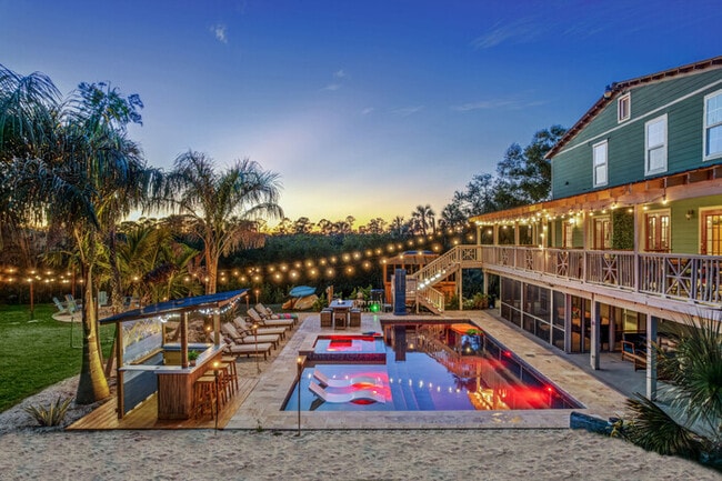 Building Photo - #1 Largest Tampa Private Compound  11BR Sl...
