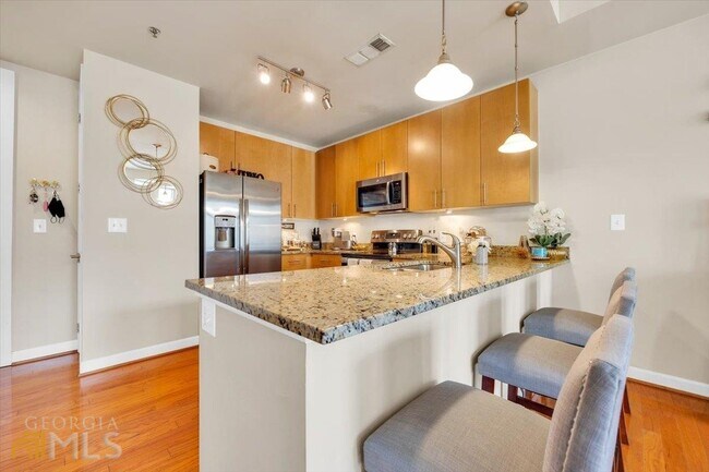 Building Photo - 711 Cosmopolitan Dr NE