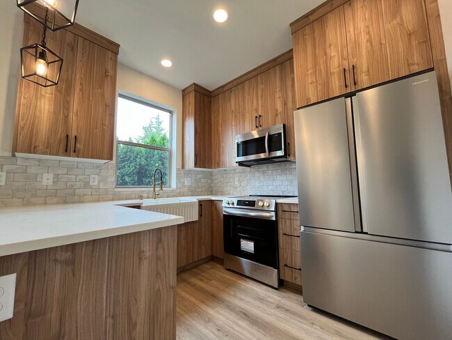 Building Photo - Brand New ~ Uniquely Built and Designed Ha...