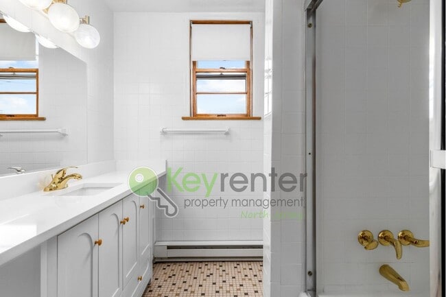Photo - 1-Bed Apartment with Hardwood Floors, In-U...
