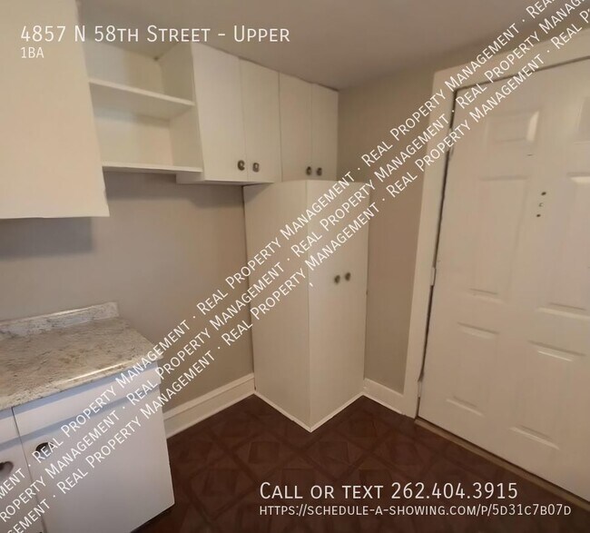 Building Photo - One Bedroom Upper
