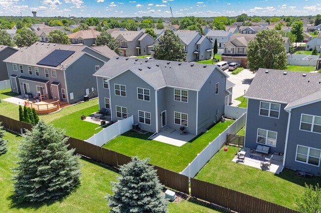Building Photo - Spacious 4-Bedroom, 3.5-Bathroom Townhome & 2-Car Garage-West Champaign