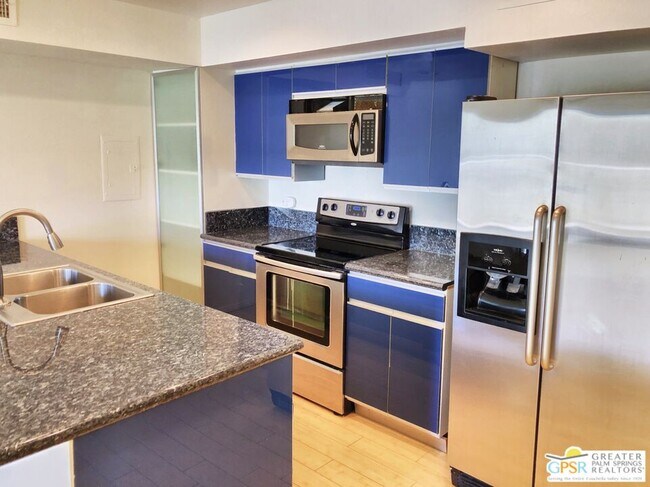 Building Photo - 1655 E Palm Canyon Dr