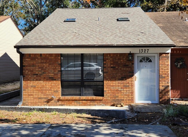 Building Photo - Updated 2 bedroom duplex with all wood flo...