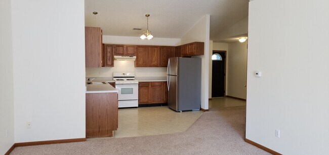 OPEN CONCEPT Living Room/Dining Room/Kitchen. - 304 Cayman St Townhome