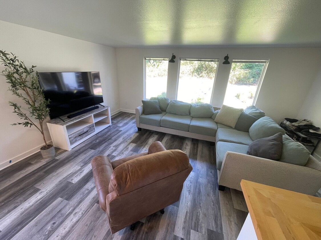 Primary Photo - Charming 4-Bedroom with Open Floor Plan & ...