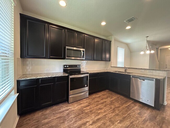 Building Photo - Stylish 4-Bedroom Home with Dual Living Sp...