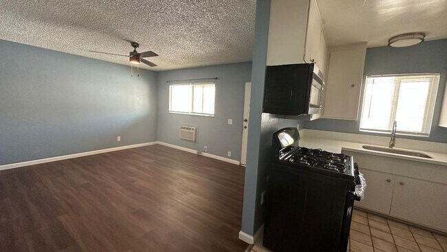 living room and kitchen - 3722 Van Buren Blvd