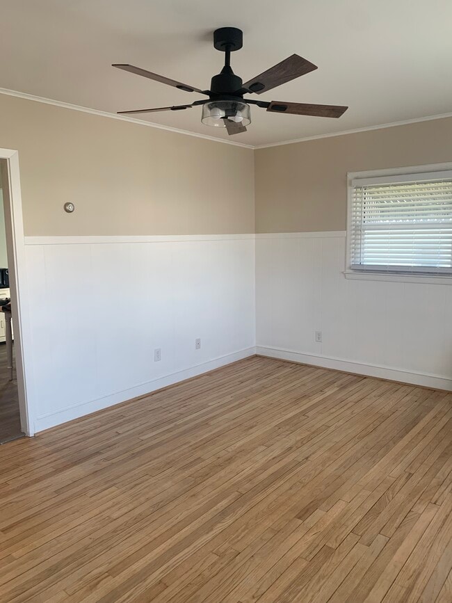 Living room with hard wood floors - 1 Bunche St