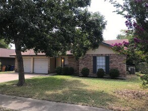 Building Photo - 10009 Woodstock Dr
