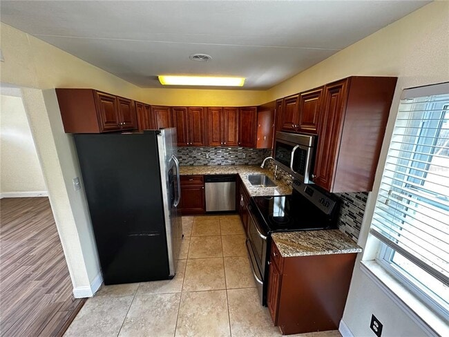 Building Photo - 8933 Narcissus Ave