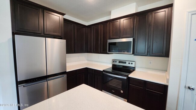 Foto del edificio - 9885 Fiddleback Ln
