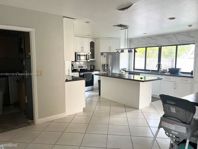 Building Photo - 4 br, 2 bath House - 7363 NW 49th Ct # 7363