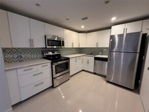 Building Photo - 5555 Collins Ave