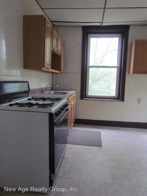 Building Photo - 6809 Woodland Ave
