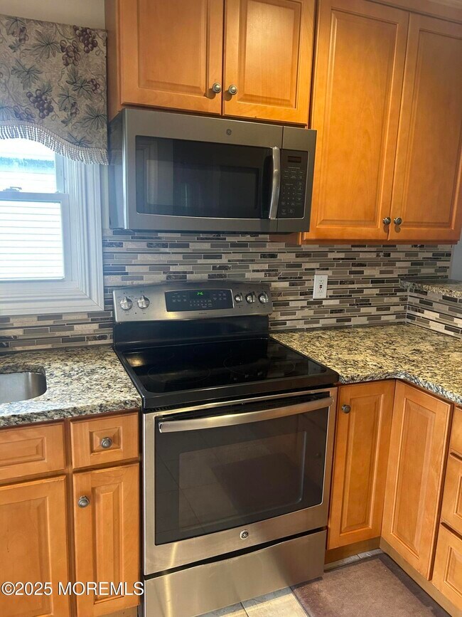 Foto del edificio - 77 Castle Harbor Dr