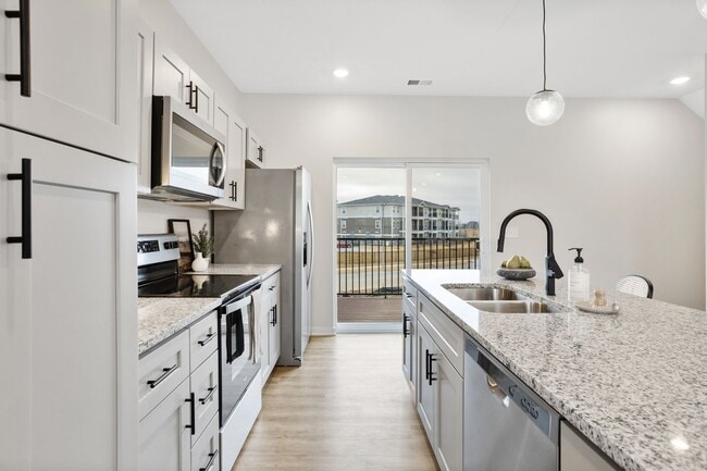 Building Photo - New Construction Elkhorn Townhome- 3 Bed 2...