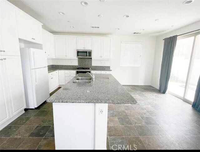 Building Photo - 16453 Globetrotter Ave