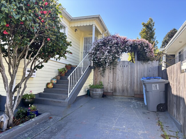 Front steps and parking spot - 1140 Addison St